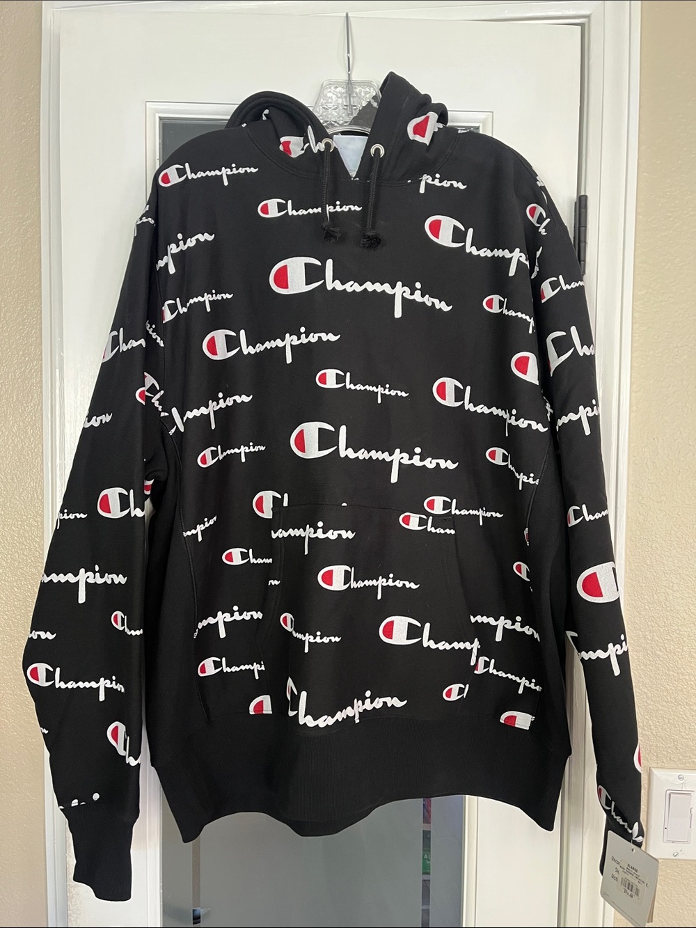 Champion Black Allover Logo Pullover Hoodie with White & Red Accents
